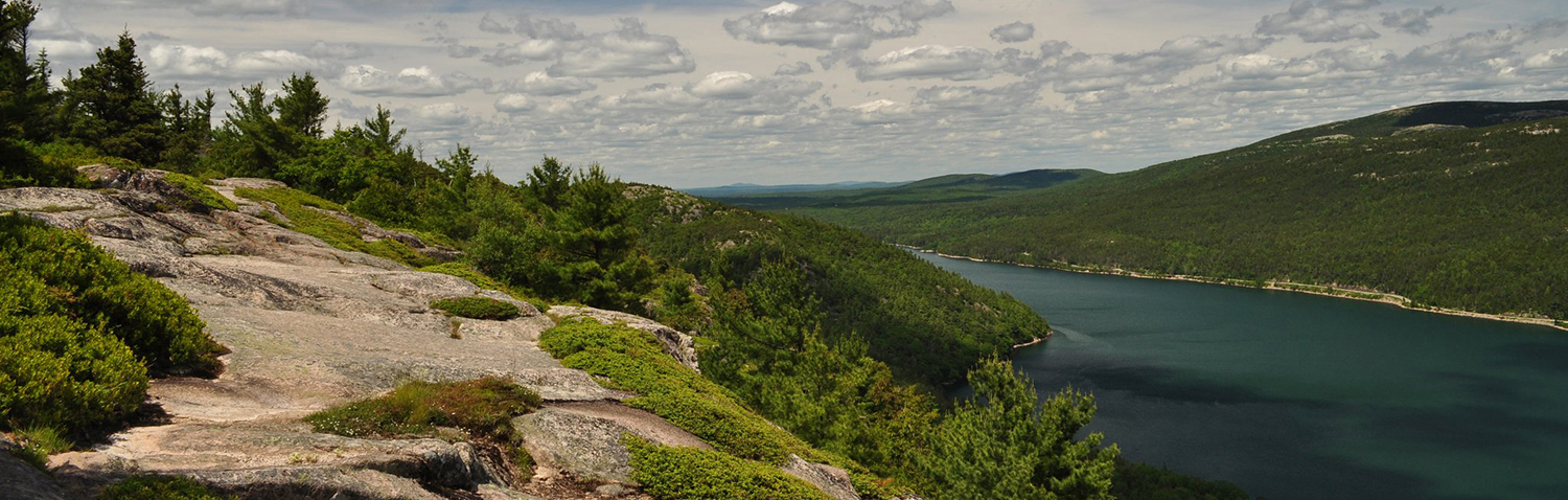 Pink granite on St. Saveur Mountain, with Somes Sound below