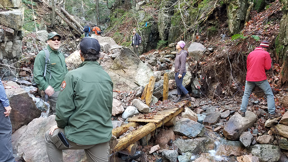 ANP and FOA staff survey damage to the Maple Spring Trail during a site visit in November 2021. 